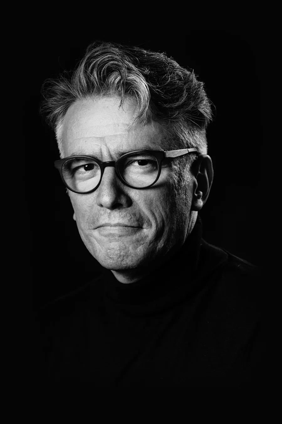 Black-and-white portrait of Felipe Csaszar in a black turtleneck