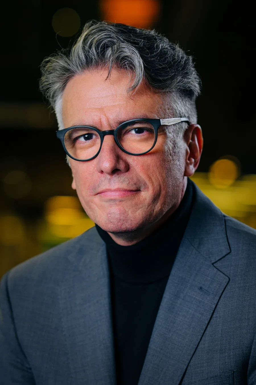 Felipe Csaszar in a gray jacket and black turtleneck